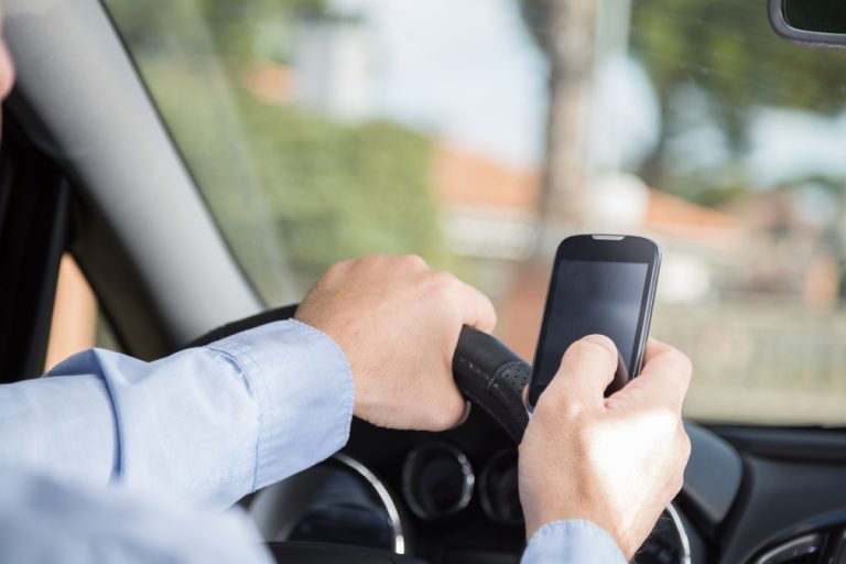 Distracted Driving Accidents: Legal Implications And Solutions